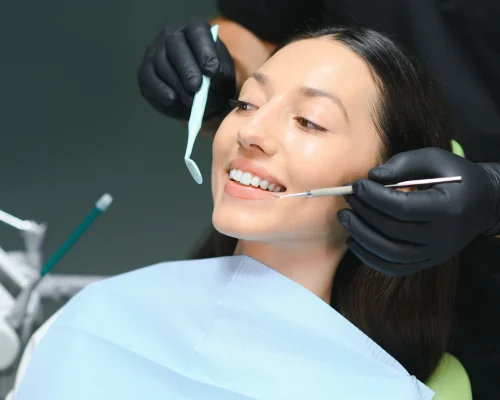 doctor-examining-patient-s-teeth-closeup-cosmeti-2026-01-08-22-33-30-utc-scaled-1.webp